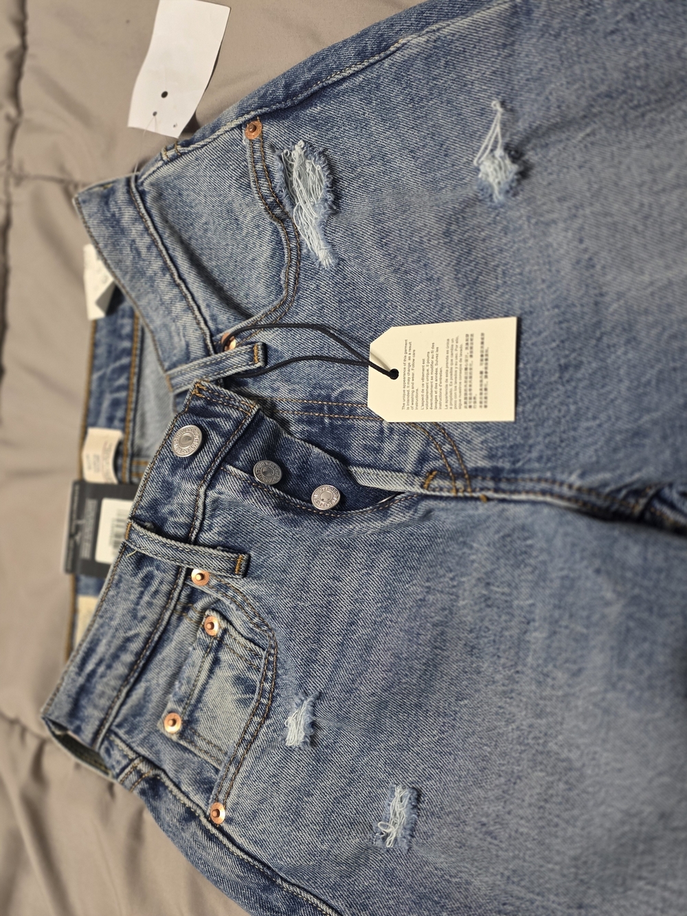 Levi's Medium Blue High-Rise Distressed Button-Fly Jeans